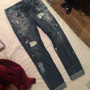 Distressed/ painted jeans